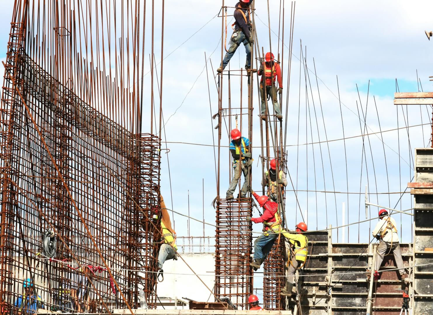 Construction site with active job trailer and crew at work