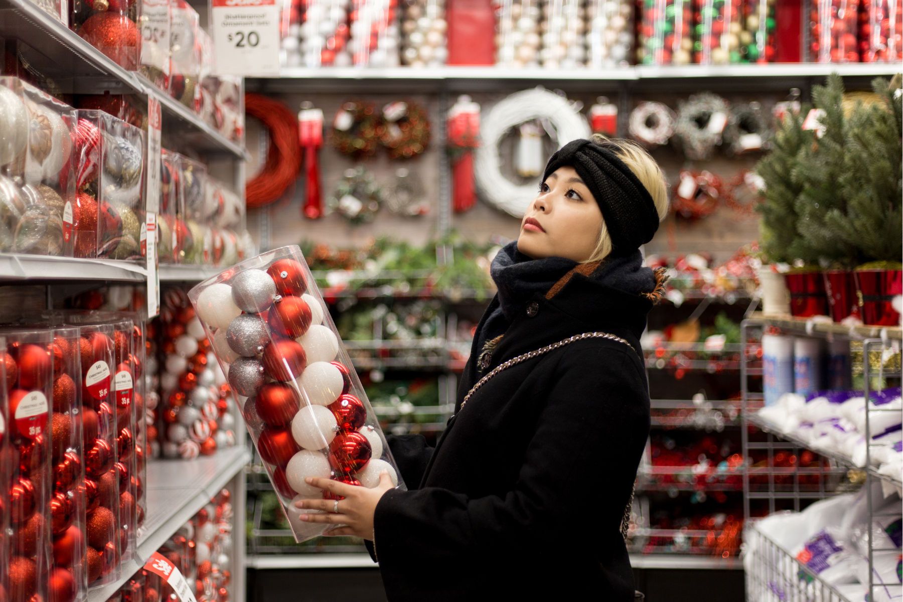 Woman shopping for Christmas ornaments